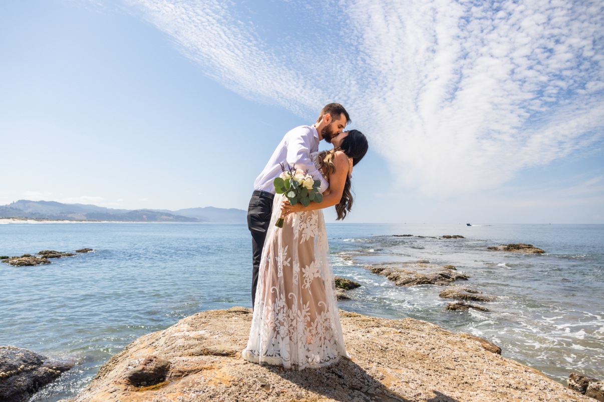 Couple sharing a dance dip at sunset